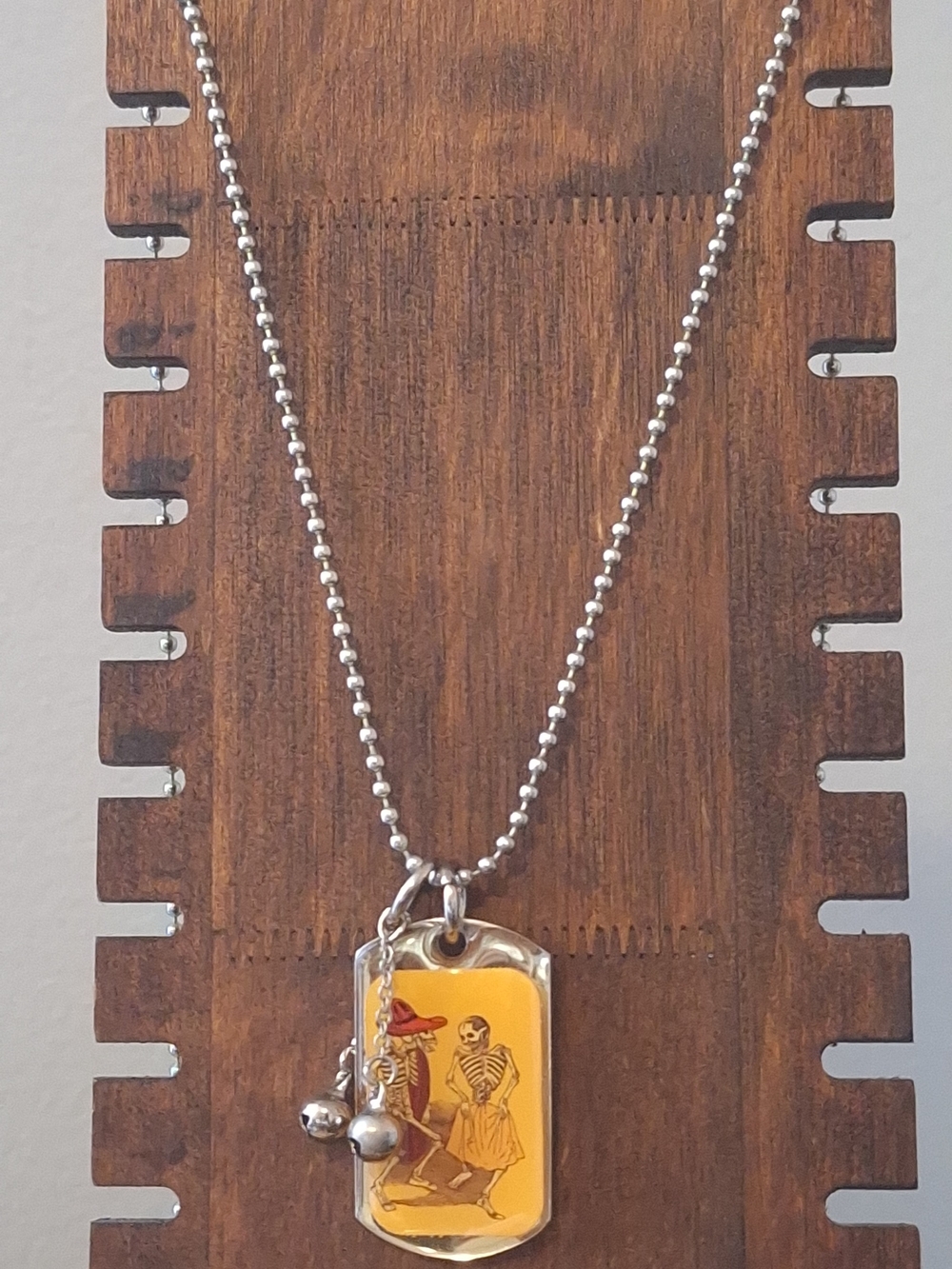 Silver-tone Yellow Skeleton Illustration Pendant Necklace